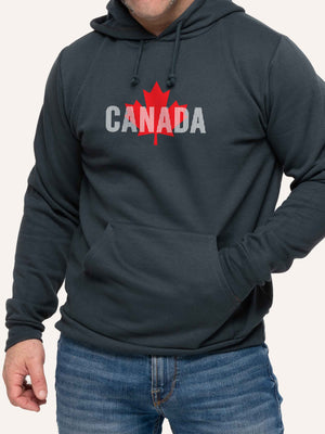 Man wearing Grey Hoodie sweatshirt with Canada in white vertical lines and red maple leaf - Made in Canada by Choose Canadian Apparel Co