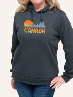 Woman wearing Grey Hoodie sweatshirt with Canada sunset canoe trees and mountains - sweatshirt for camping - Made in Canada by Choose Canadian Apparel Co