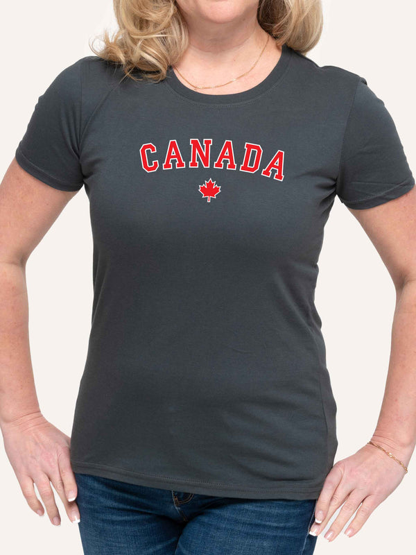 Woman wearing grey t-shirt with canada slogan in block letters and red maple leaf - Made in Canada by Choose Canadian Apparel Co