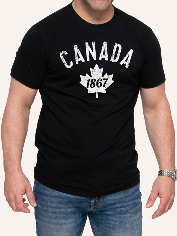 Man wearing black tshirt with Canada 1867 and Maple Leaf - Made in Canada by Choose Canadian Apparel Co