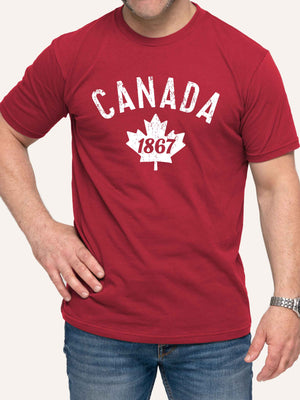 Man wearing red tshirt with Canada 1867 and Maple Leaf - Made in Canada by Choose Canadian Apparel Co