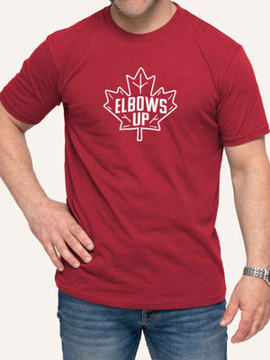 Man wearing red tshirt with Elbows Up slogan and Maple Leaf - Made in Canada by Choose Canadian Apparel Co