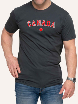 Man wearing grey t-shirt with Maple Leaf and CANADA block letters - Made in Canada by Choose Canadian Apparel Co
