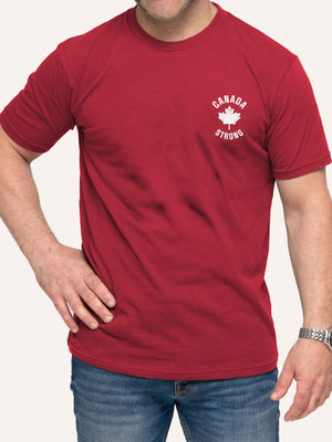 Man wearing red t-shirt with canada strong slogan and maple leaf - Made in Canada by Choose Canadian Apparel Co
