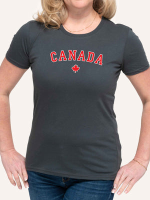 Woman wearing grey t-shirt with canada slogan in block letters and red maple leaf - Made in Canada by Choose Canadian Apparel Co