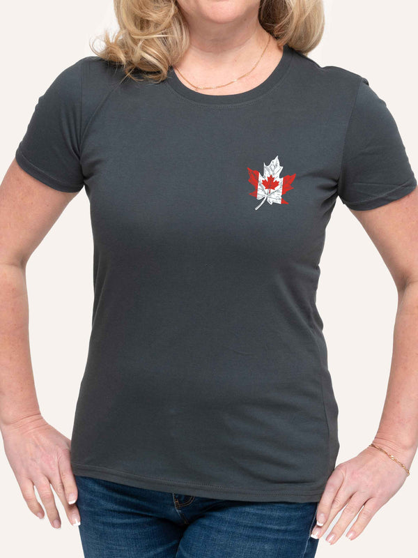 Woman wearing ladies dark grey t-shirt with canada flag in shape of maple leaf graphic at left pocket location - Made in Canada by Choose Canadian Apparel Co