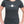 Woman wearing dark grey t-shirt with maple leaf and heartbeat pulse graphic - Made in Canada by Choose Canadian Apparel Co