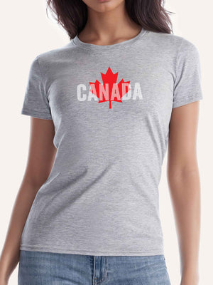 Woman wearing light grey t-shirt with red maple leaf and canada day graphic - Made in Canada by Choose Canadian Apparel Co