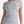 Woman wearing ladies light grey t-shirt with canada flag in shape of maple leaf graphic at left pocket location - Made in Canada by Choose Canadian Apparel Co