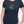 Woman wearing navy blue t-shirt with maple leaf outline line art - Made in Canada by Choose Canadian Apparel Co