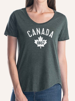 Woman wearing ladies forest green scoop t-shirt with canada maple leaf and 1867 graphic - Made in Canada by Choose Canadian Apparel Co