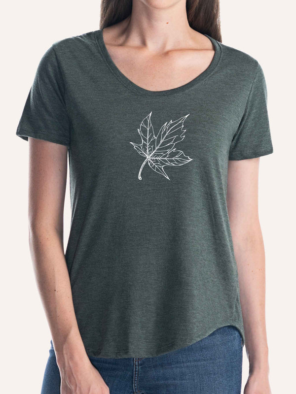 Woman wearing ladies forest green scoop t-shirt with maple leaf outline line art - Made in Canada by Choose Canadian Apparel Co