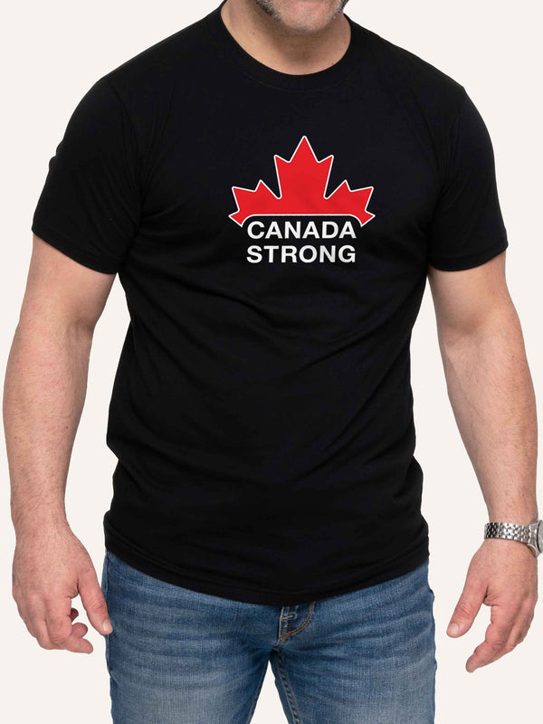 Man wearing black unisex t-shirt with Canada Strong slogan and red maple leaf - Made in Canada by Choose Canadian Apparel Co