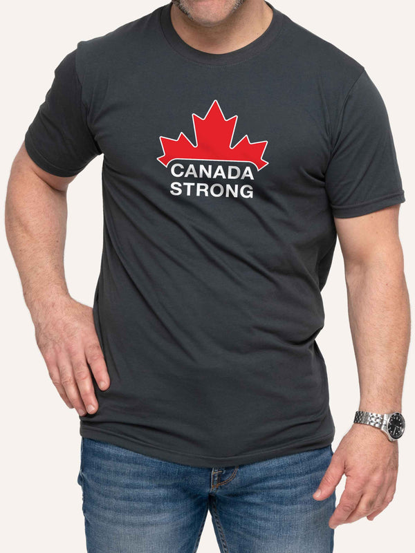 Man wearing grey unisex t-shirt with Canada Strong slogan and red maple leaf - Made in Canada by Choose Canadian Apparel Co