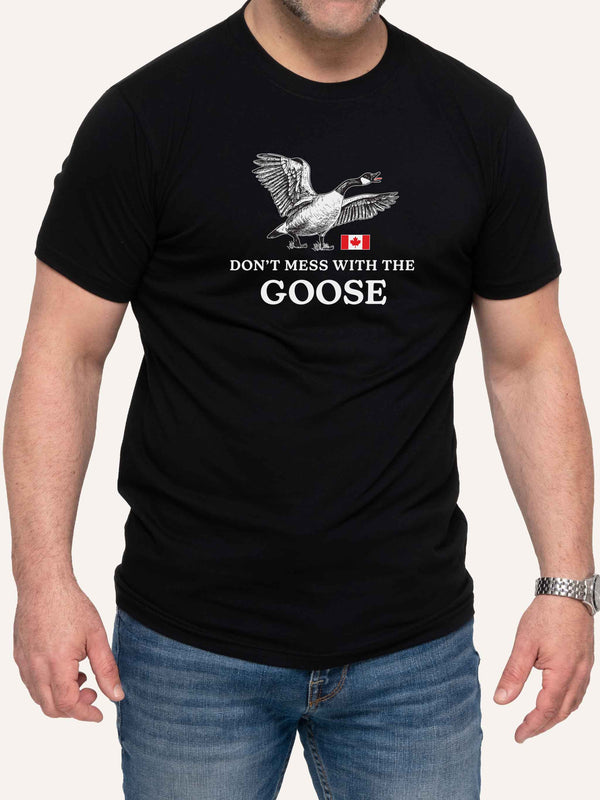Man wearing black tshirt with Don't Mess With The Goose slogan and Canada Flag - Made in Canada by Choose Canadian Apparel Co