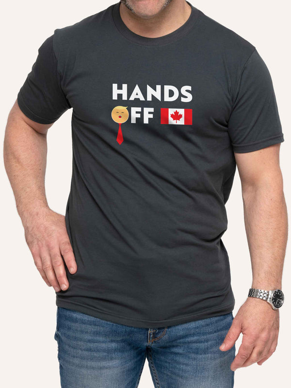 Man wearing Gray t-shirt with Hands Off slogan and Canada Flag and Trump Face - Made in Canada by Choose Canadian Apparel Co