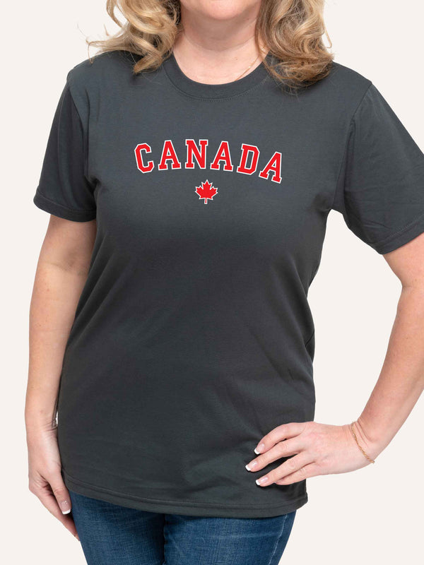 Woman wearing grey tshirt with Canada  and red Maple Leaf - Made in Canada by Choose Canadian Apparel Co