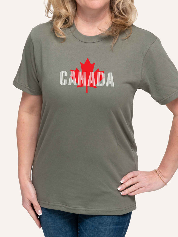 Woman wearing green t-shirt with Maple Leaf and vertical white lines - Made in Canada by Choose Canadian Apparel Co