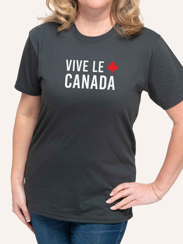 Woman wearing unisex charcoal grey tshirt with Vive Le Canada slogan and Maple Leaf - Made in Canada by Choose Canadian Apparel Co