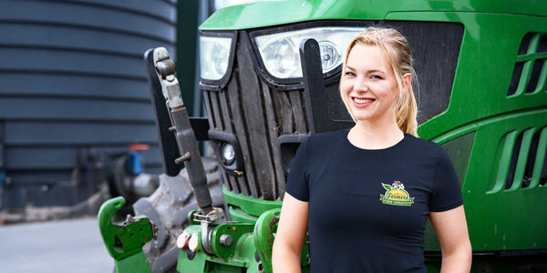 Farmer wearing a navy shirt promoting Canadian farming - Made in Canada by Choose Canadian Apparel Co