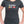 Woman wearing grey tshirt with Trump Hands Off slogan and Canada Flag - Made in Canada by Choose Canadian Apparel Co