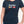 Woman wearing navy blue tshirt with Trump Hands Off slogan and Canada Flag - Made in Canada by Choose Canadian Apparel Co
